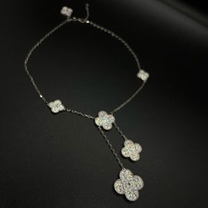 VCA Clover Motif necklace. In Silver 925 / 18k White Gold plating. CZ Crystals.